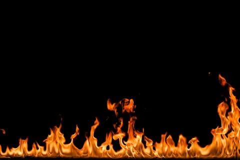 Fire flames on black background. Stock Photos