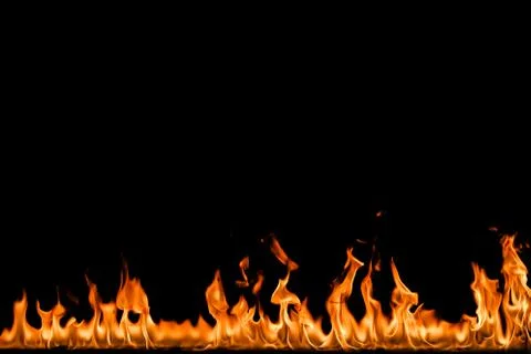 Fire flames on black background. Stock Photos