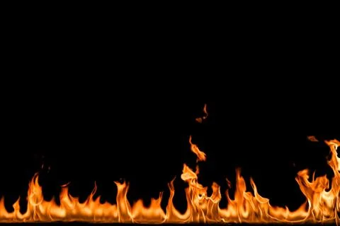 Fire flames on black background. Stock Photos