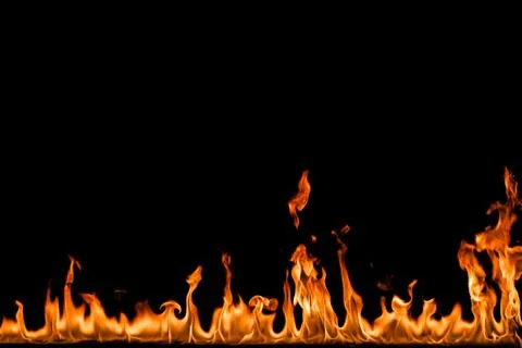 Fire flames on black background. Stock Photos