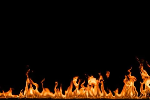 Fire flames on black background. Stock Photos