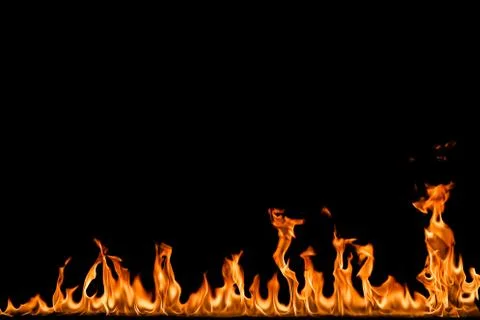 Fire flames on black background. Stock Photos