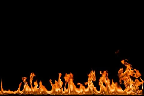 Fire flames on black background. Stock Photos