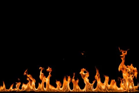 Fire flames on black background. Stock Photos