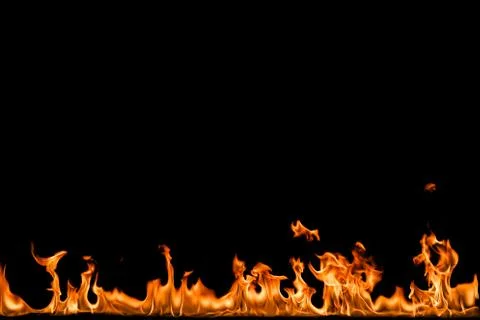 Fire flames on black background. Stock Photos