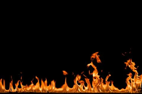 Fire flames on black background. Stock Photos