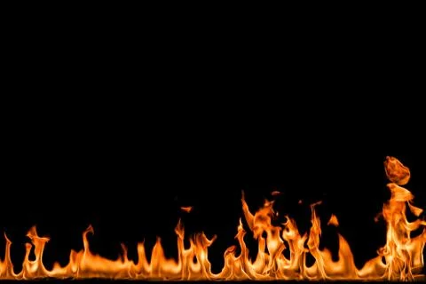 Fire flames on black background. Stock Photos