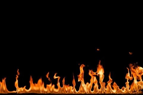 Fire flames on black background. Stock Photos