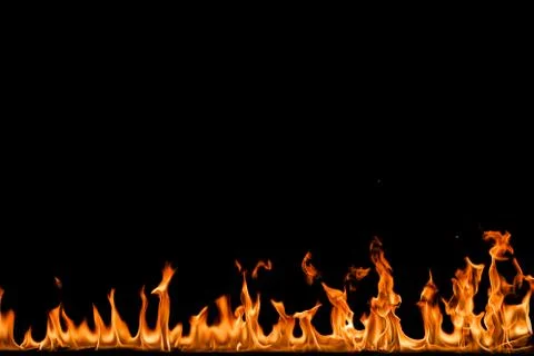 Fire flames on black background. Stock Photos