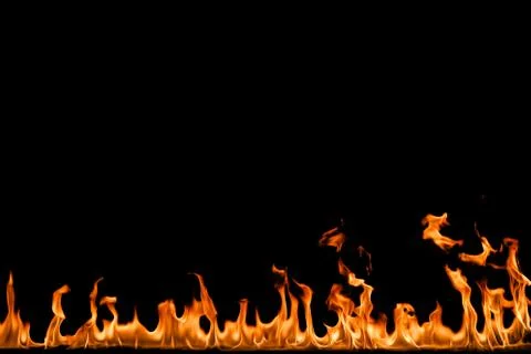 Fire flames on black background. Stock Photos