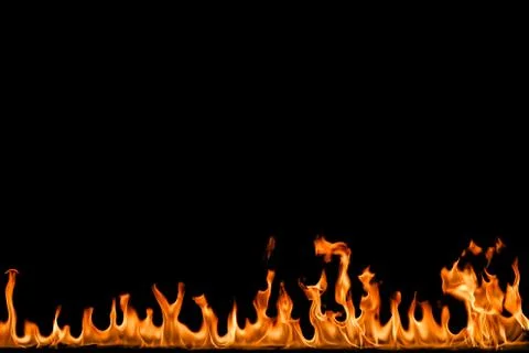 Fire flames on black background. Stock Photos