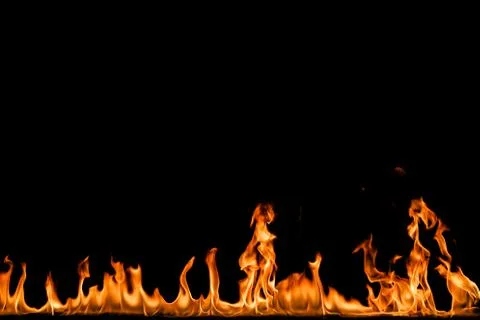 Fire flames on black background. Stock Photos