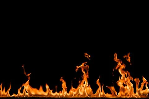 Fire flames on black background. Stock Photos