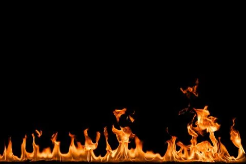 Fire flames on black background. Stock Photos