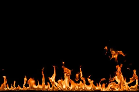 Fire flames on black background. Stock Photos