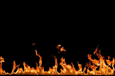 Fire flames on black background. Stock Photos