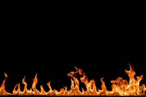 Fire flames on black background. Stock Photos