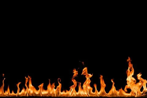 Fire flames on black background. Stock Photos