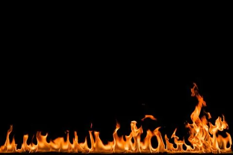Fire flames on black background. Stock Photos