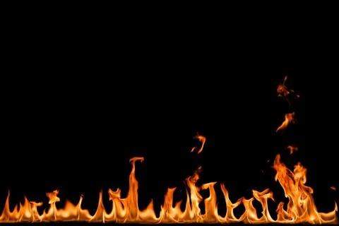 Fire flames on black background. Stock Photos