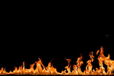 Fire flames on black background. Stock Photos