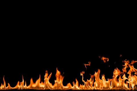 Fire flames on black background. Stock Photos