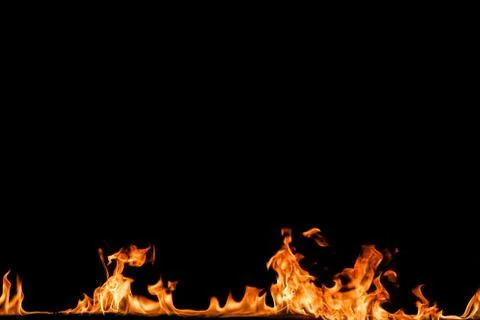 Fire flames on black background. Stock Photos