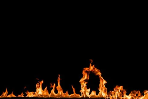 Fire flames on black background. Stock Photos