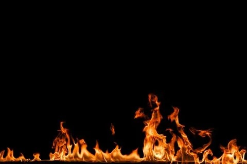 Fire flames on black background. Stock Photos