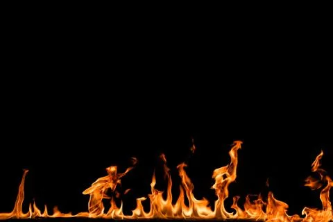 Fire flames on black background. Stock Photos