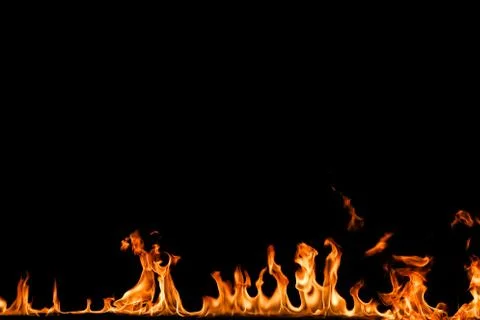 Fire flames on black background. Stock Photos