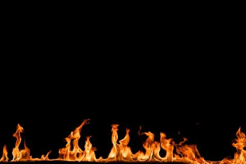 Fire flames on black background. Stock Photos