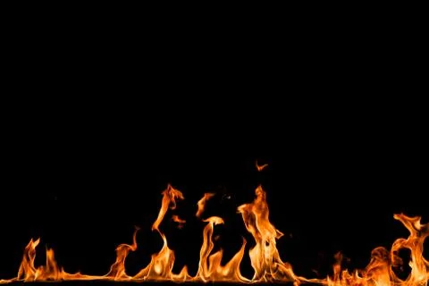 Fire flames on black background. Stock Photos