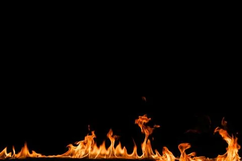 Fire flames on black background. Stock Photos