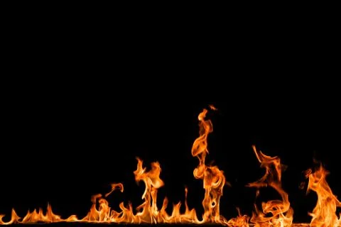 Fire flames on black background. Stock Photos