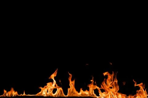 Fire flames on black background. Stock Photos