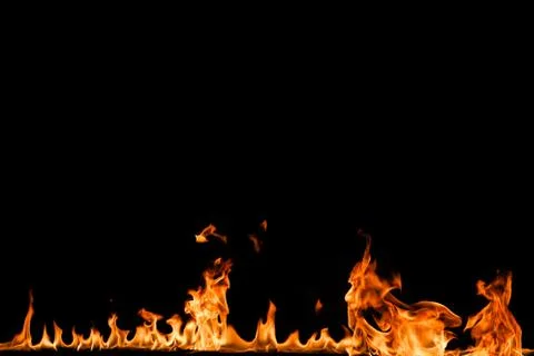 Fire flames on black background. Stock Photos