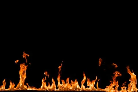 Fire flames on black background. Stock Photos