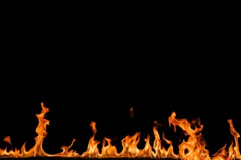 Fire flames on black background. Stock Photos