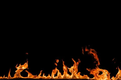Fire flames on black background. Stock Photos