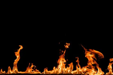 Fire flames on black background. Stock Photos