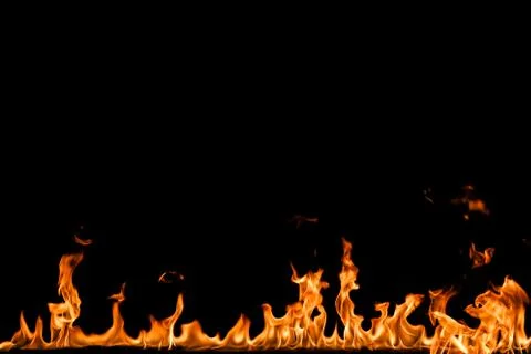 Fire flames on black background. Stock Photos
