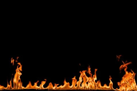 Fire flames on black background. Stock Photos
