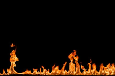 Fire flames on black background. Stock Photos