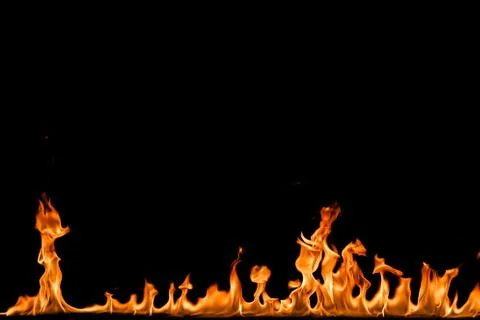 Fire flames on black background. Stock Photos