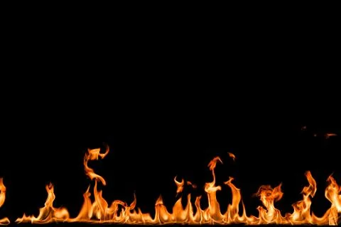 Fire flames on black background. Stock Photos