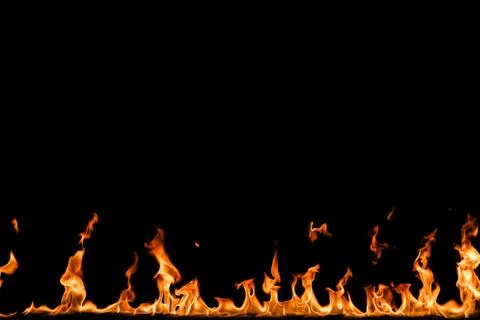 Fire flames on black background. Stock Photos