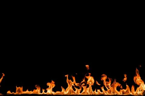 Fire flames on black background. Stock Photos