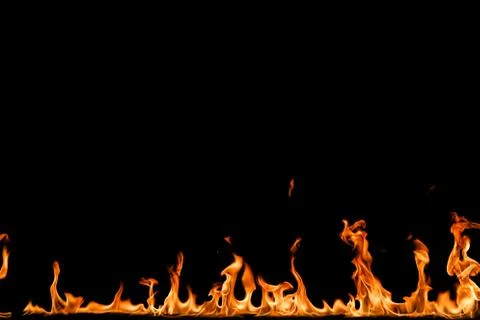Fire flames on black background. Stock Photos
