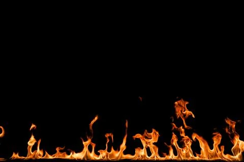 Fire flames on black background. Stock Photos
